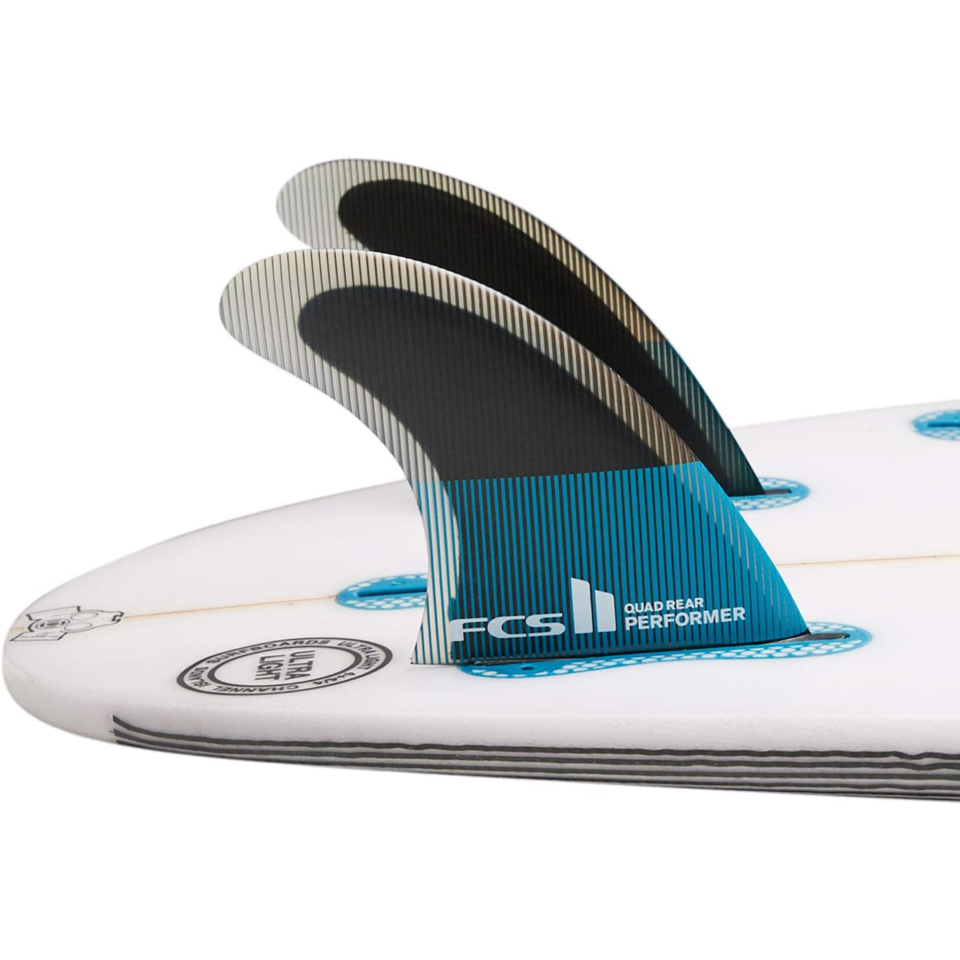 FCS II QUAD REAR Performer PC Medium Teal/Black Fins