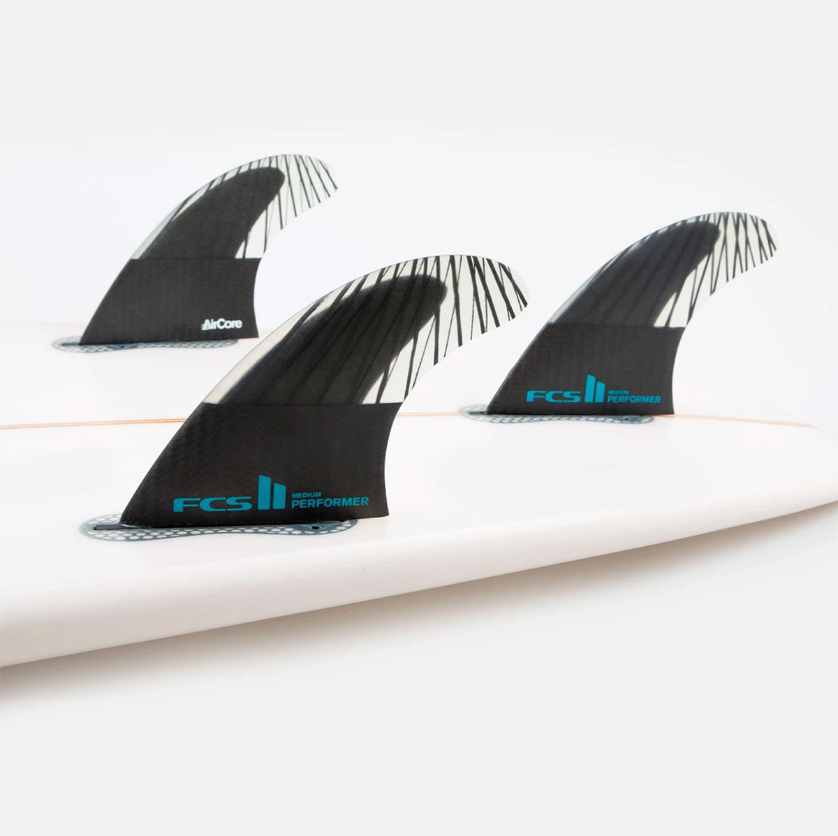FCS II THRUSTER - Performer PC Carbon Black/Teal Large - AirCore