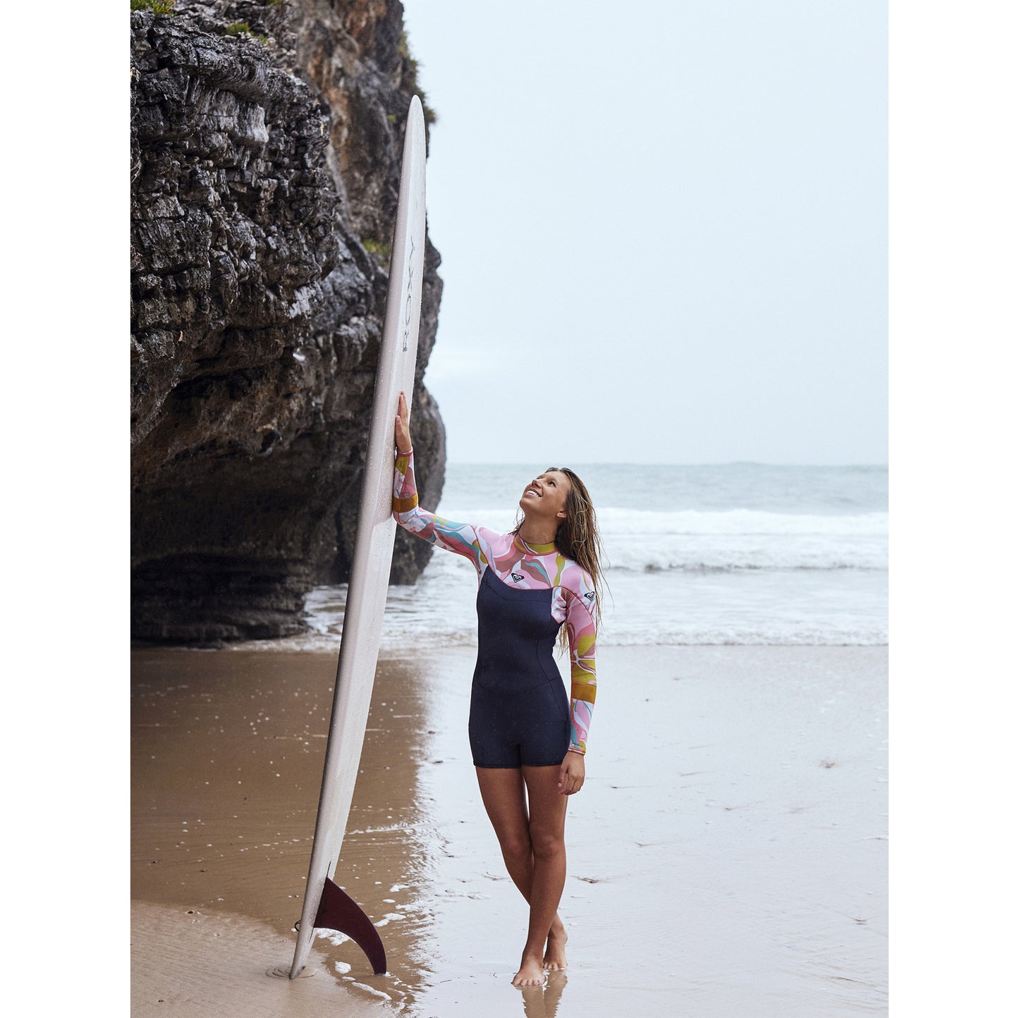 
                  
                    2/2mm Roxy  Syncro Back Zip Springsuit - Jet Gry/Coral Flme/Temple Gold
                  
                