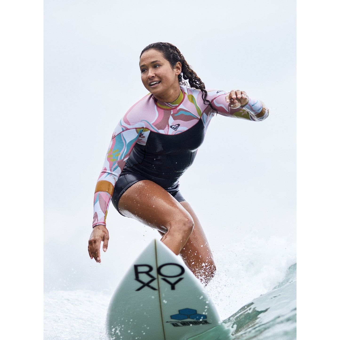 
                  
                    2/2mm Roxy  Syncro Back Zip Springsuit - Jet Gry/Coral Flme/Temple Gold
                  
                