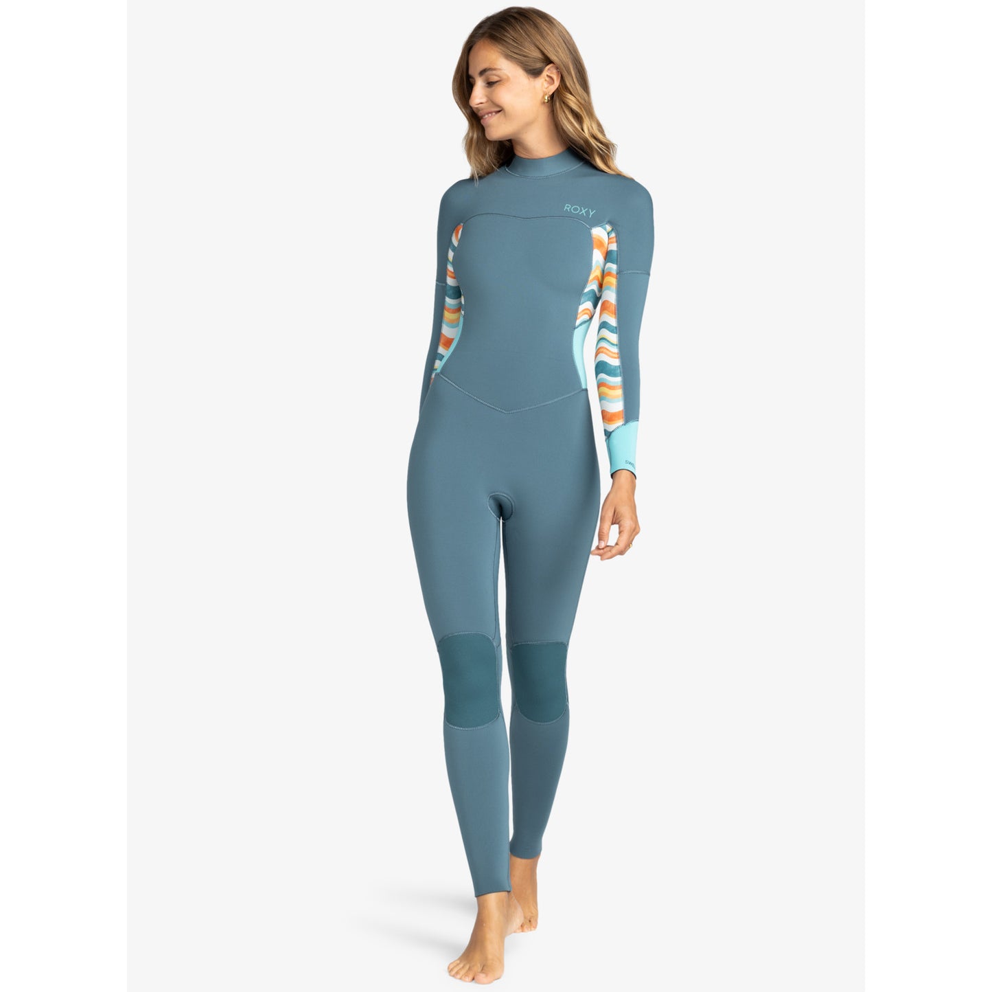 
                  
                    Woman wearing a blue wetsuit with colorful accents on a white background
                  
                