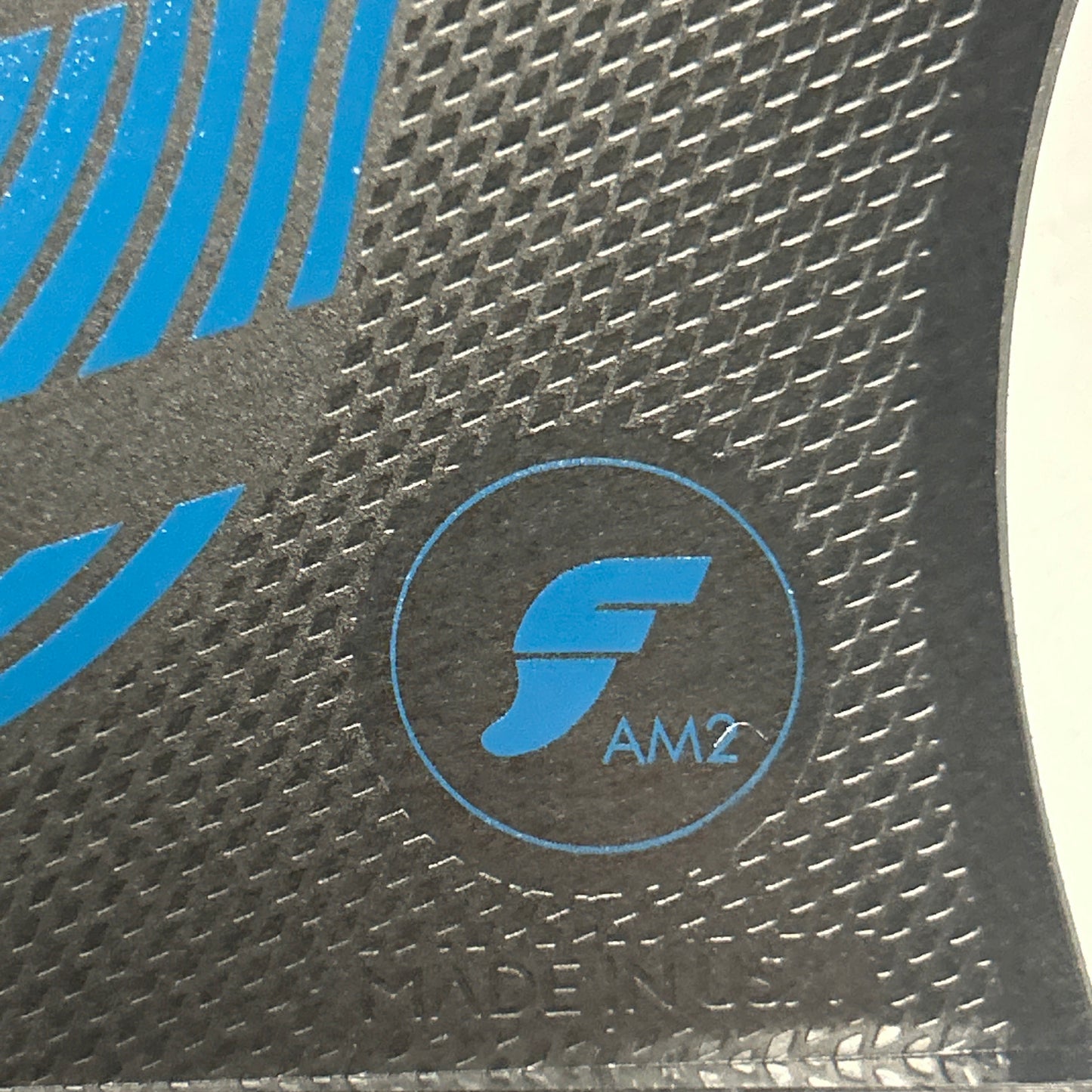 
                  
                    Futures - THRUSTER - AM2 Alpha Series Carbon/Teal Blue - Large
                  
                